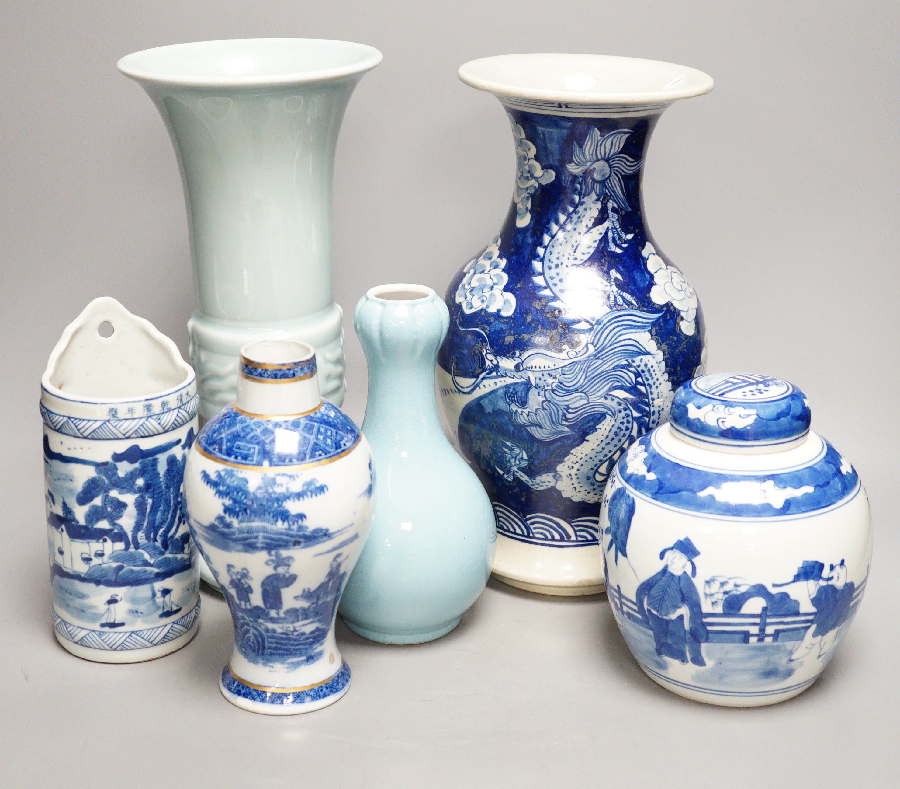 A Chinese blue and white vase, two jars, a beaker vase, a double gourd vase and a pearlware vase, tallest 31cm